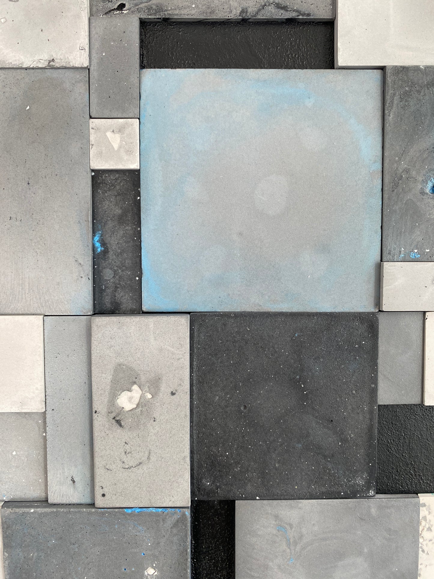 Pattern of gray and black square tiles