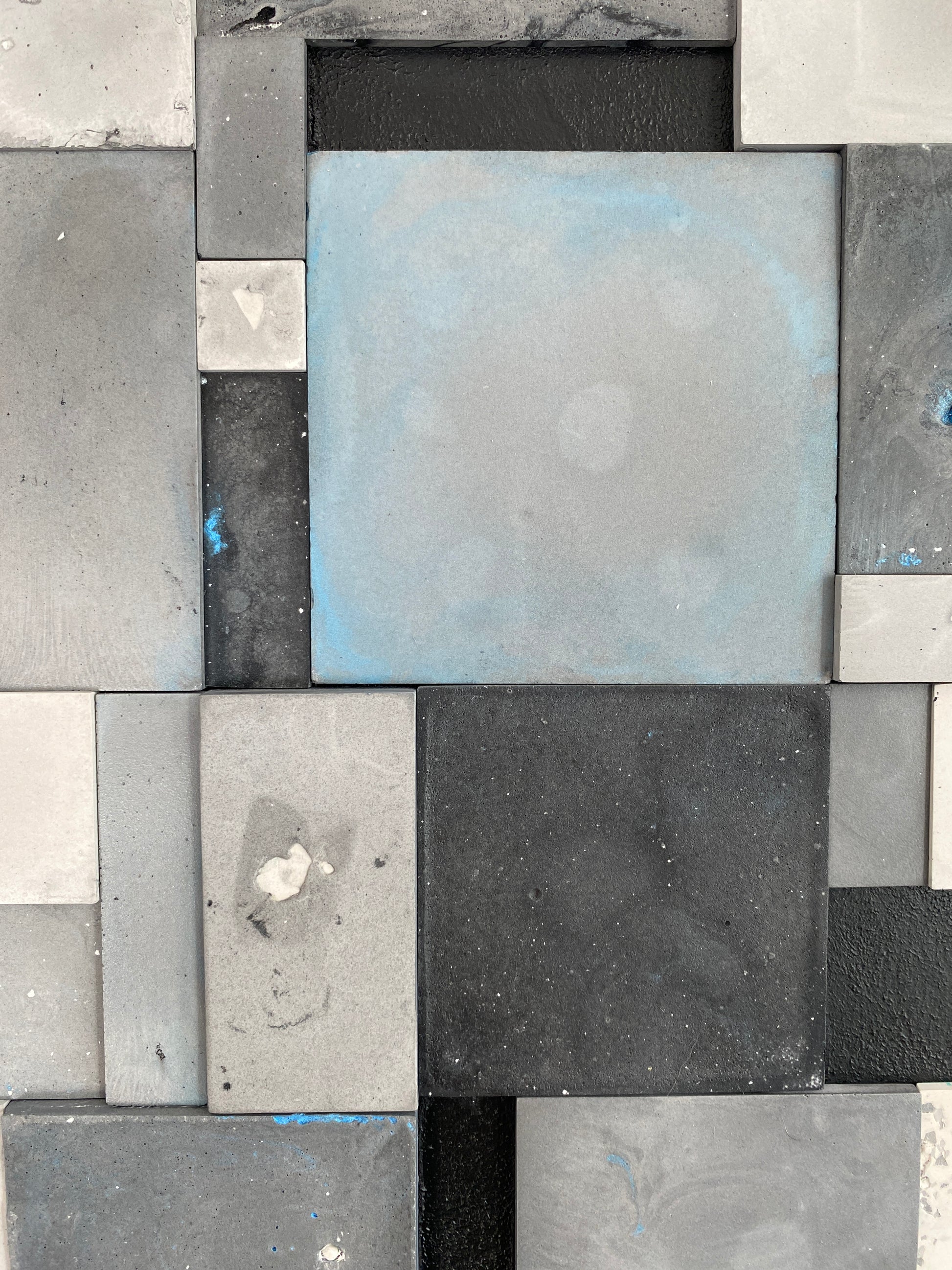 Pattern of gray and black square tiles