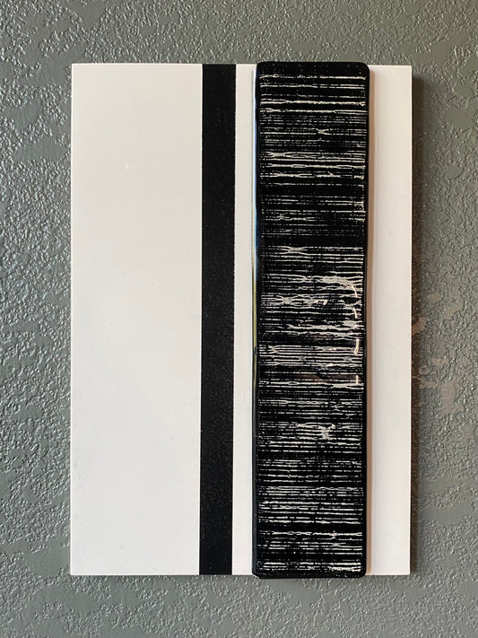 Striped cremation ash memorial wall art with flowing glass stripes on white frame and vertical black accent