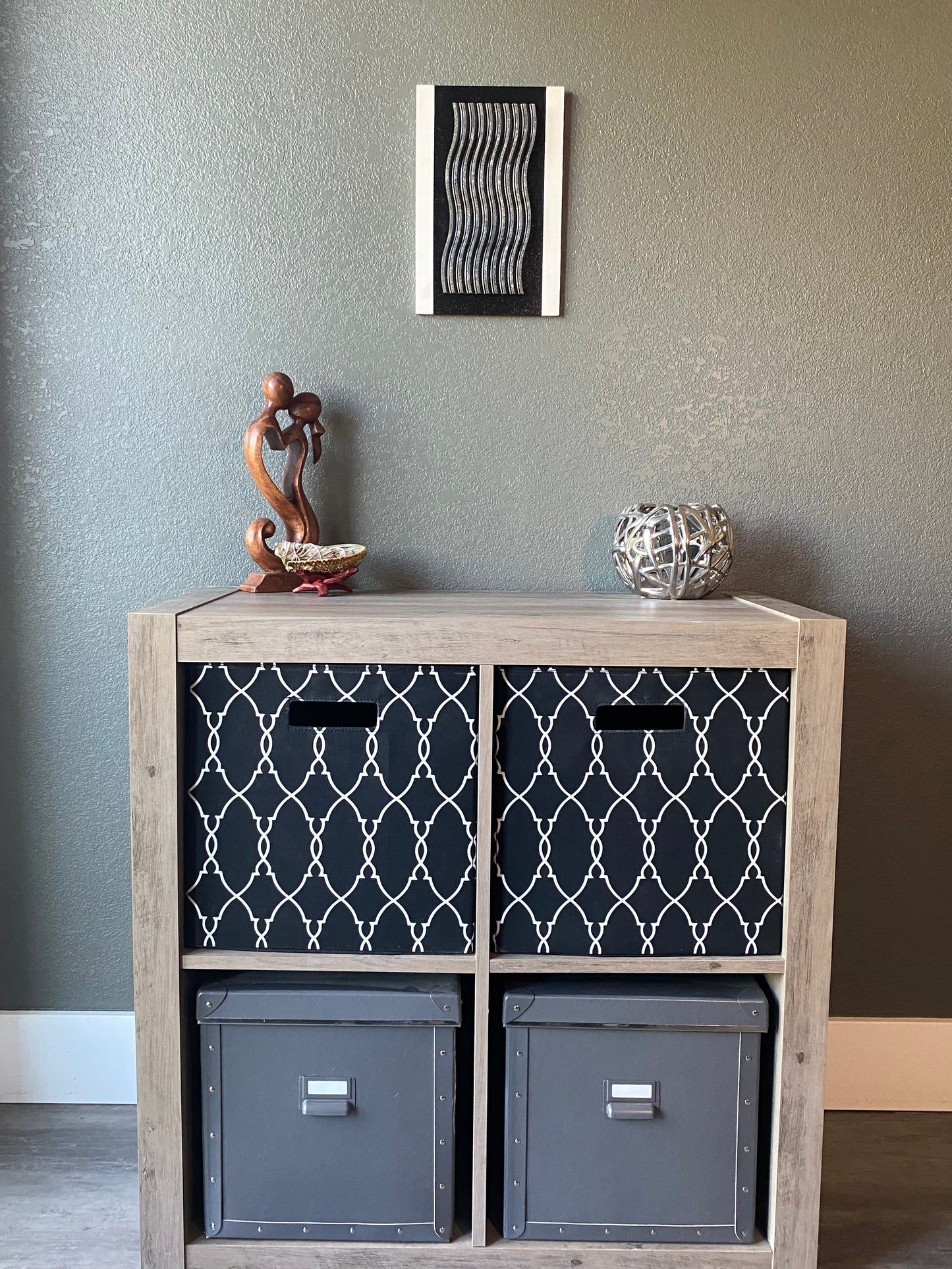 Front view of memorial wall art showing textured black stripe, resin wave pattern, and handcrafted white frame