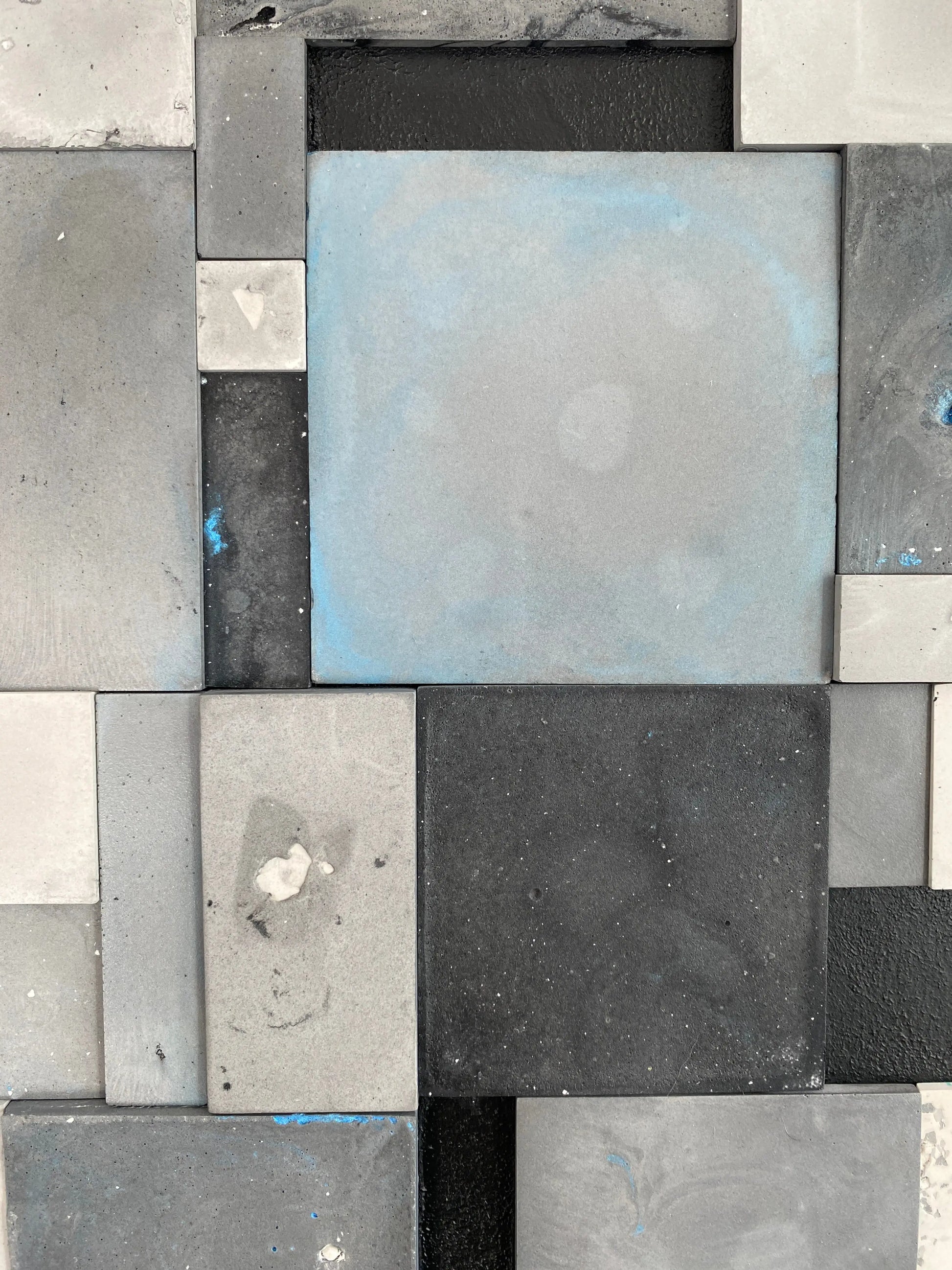 Pattern of gray and black square tiles