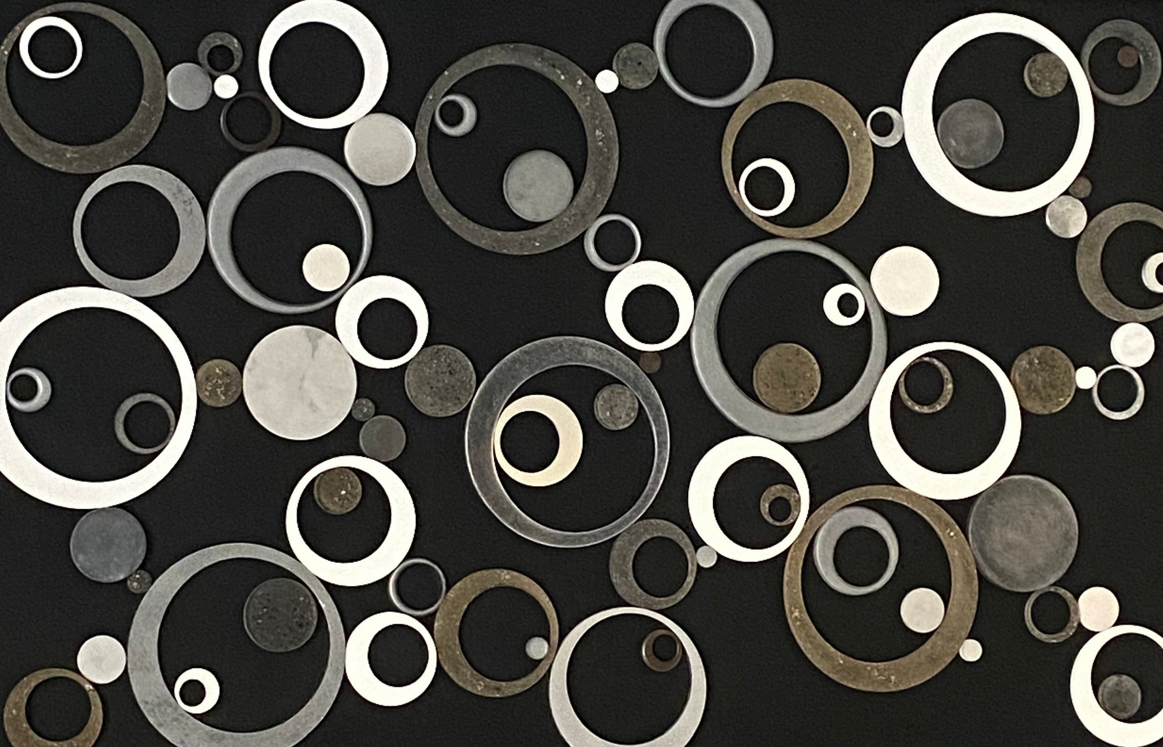 Abstract cremation circles on black