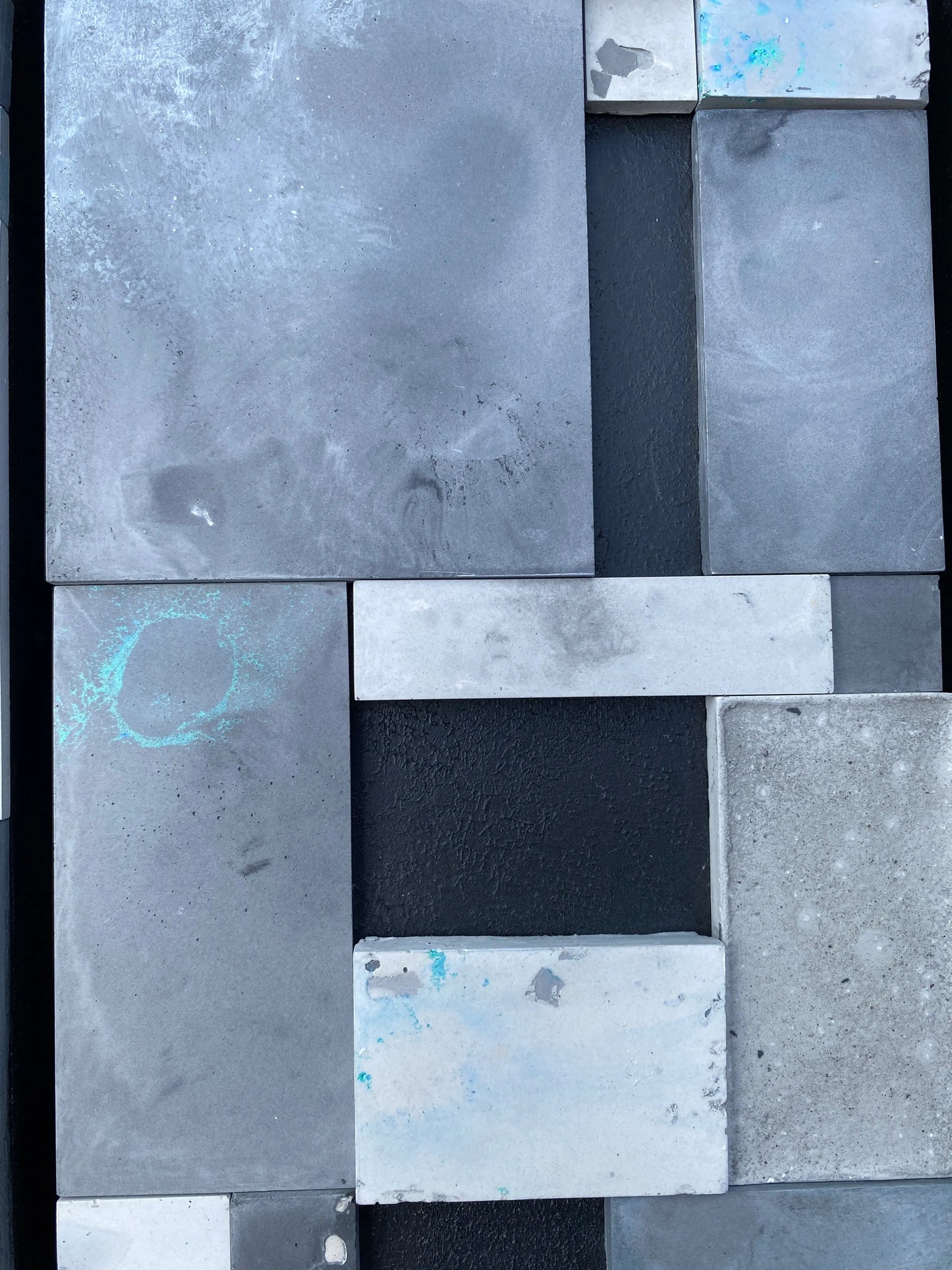 Pattern of gray and black square tiles