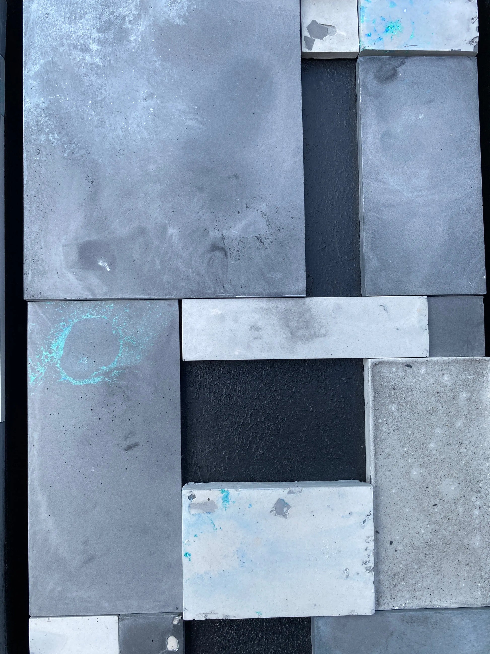 Pattern of gray and black square tiles