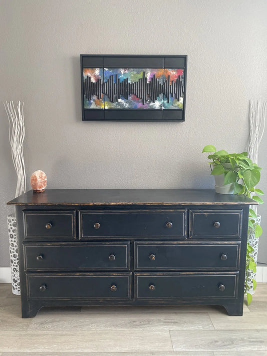 Multicolored mixed‑media artwork featuring a vertical soundwave pattern made from layered acrylic, resined wood, and metal on a handmade cradled panel, framed in a custom floating frame