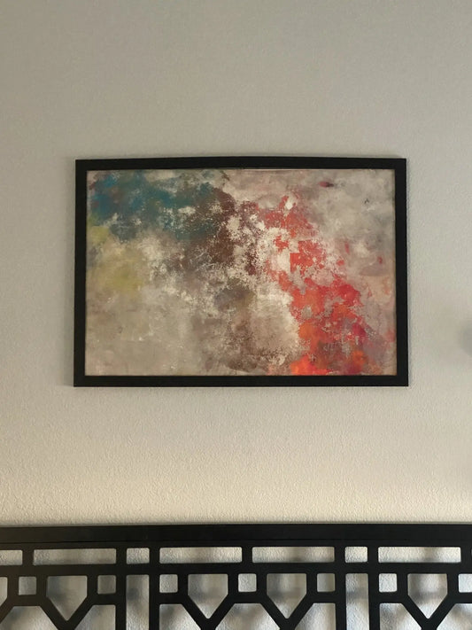 Abstract artwork created with acrylic paint on screen door material, framed in wood with layered, vibrant colors.