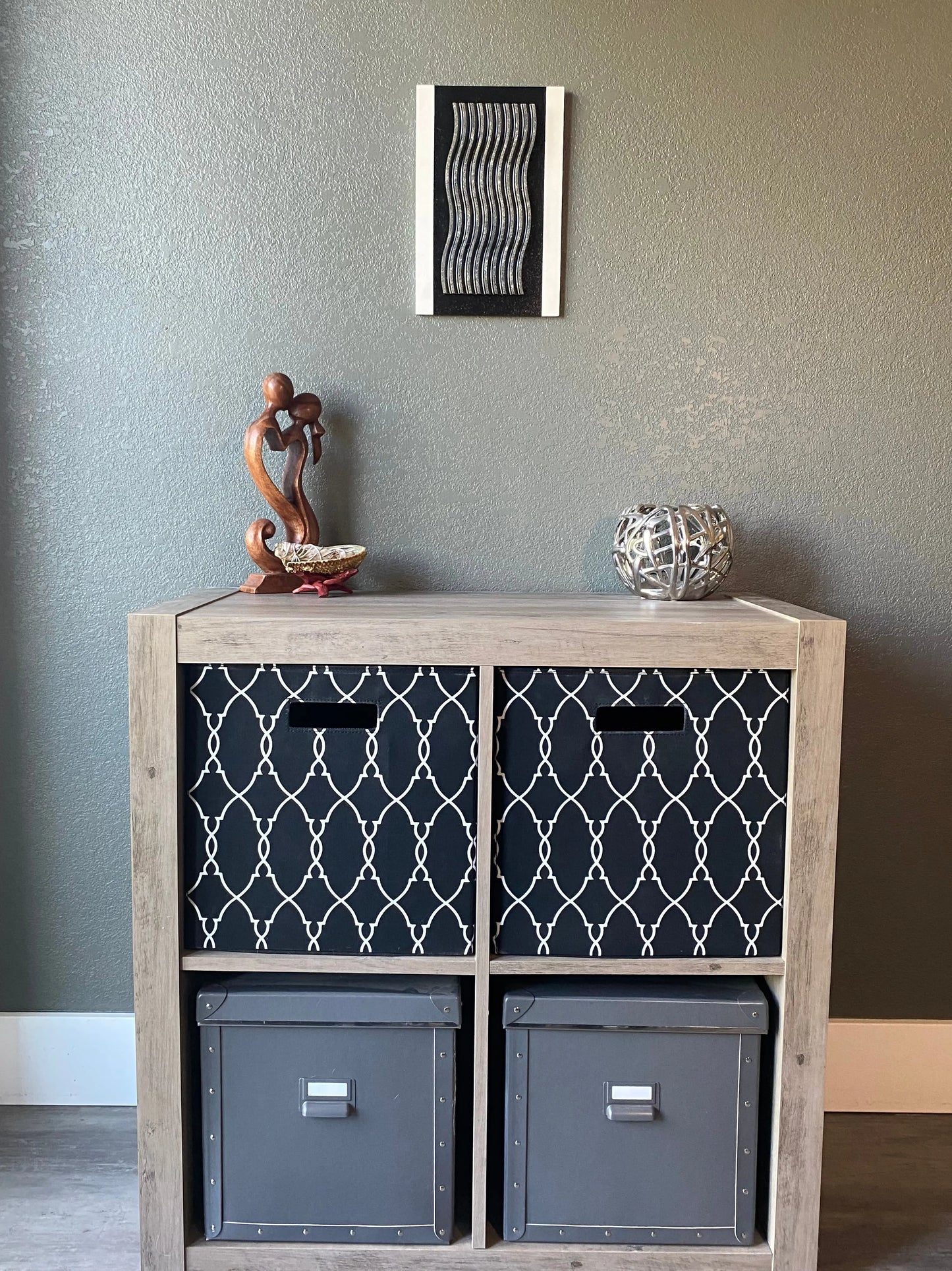 Front view of memorial wall art showing textured black stripe, resin wave pattern, and handcrafted white frame