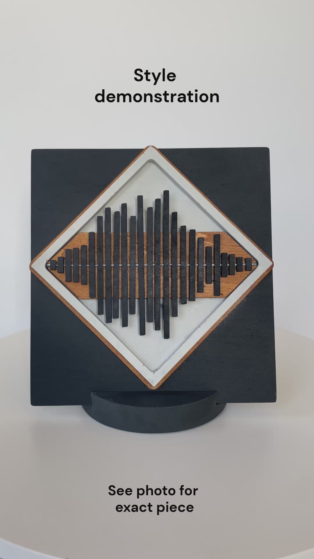 Rotating view of the Always With You Sound Wave Diamond Display Piece in plain cement, demonstrating the design and shape.